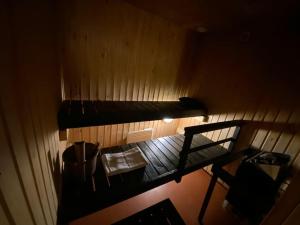 an overhead view of a room with two bunk beds at Two bedroom cottage with peaceful views in Jyväskylä