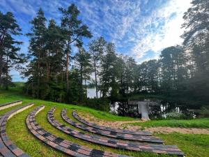 a set of amphitheater seats in a park at Nakvisa in Zarasai