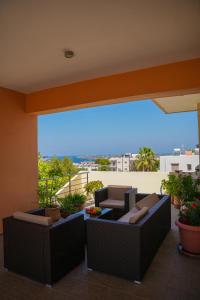 A seating area at Villa Fotini with ocean view