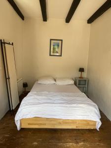 Кровать или кровати в номере Maison du Viaduc du bout de la ville