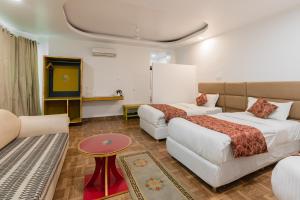 Ένα ή περισσότερα κρεβάτια σε δωμάτιο στο Hotel Ratnasambhava