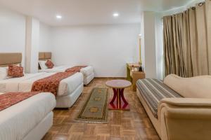 Ένα ή περισσότερα κρεβάτια σε δωμάτιο στο Hotel Ratnasambhava