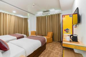 Postel nebo postele na pokoji v ubytování Hotel Ratnasambhava + 23 fotografií