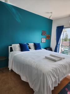 Postel nebo postele na pokoji v ubytování Pinpoint Hotel Phuket