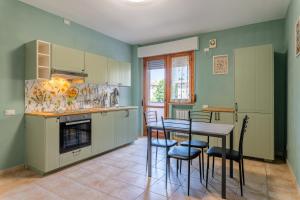 Kuchyň nebo kuchyňský kout v ubytování San Concordio Apartments - Affitti Brevi Italia