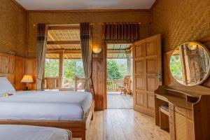 Postel nebo postele na pokoji v ubytování Mulia Garden Bungalows - Monthly Rate Available