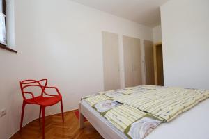 Postel nebo postele na pokoji v ubytování Apartments Tena