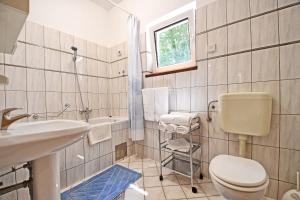 Koupelna v ubytování Apartments Tena