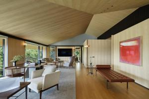 a living room with a couch and a table at Park Hyatt Kyoto in Kyoto