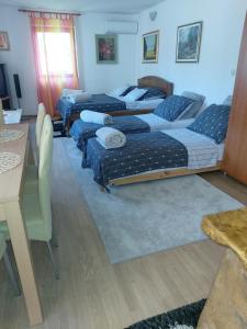 Posteľ alebo postele v izbe v ubytovaní Studio apartman KOTRO