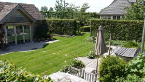 Zahrada ubytování B&B Hemel & Haard