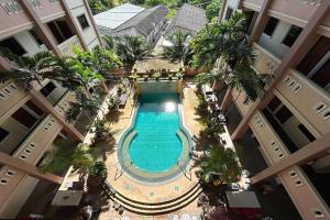 an overhead view of a swimming pool in a building at SB Park Mansion in Phuket Town