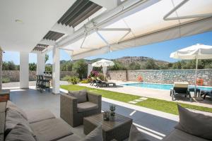 The swimming pool at or close to Kastalys Villa