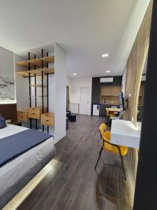 Postel nebo postele na pokoji v ubytování Jani Studio Apartments