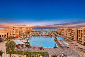 an aerial view of a resort with a large swimming pool at Pickalbatros White Beach Resort - Hurghada in Hurghada
