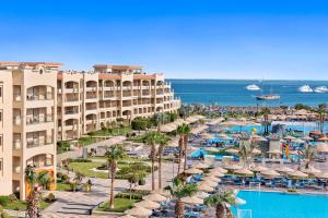 an aerial view of a resort with a swimming pool at Pickalbatros White Beach Resort - Hurghada in Hurghada
