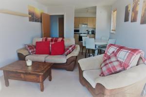 a living room with two couches and a coffee table at 2BR Apt in Crawley w Parking - Near Gatwick in Crawley