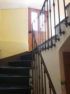 a set of stairs in a house with a window at Studio 11T Sleeps 2 with WiFi in Beausoleil
