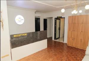 a room with a reception sign on the wall at Honey Suite Room Inside Bee Cafe Cebu at Ayala Area in Cebu City