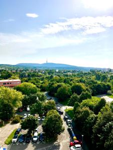 an aerial view of a parking lot with cars parked at BIG 3 separate rooms convenient City HAVEN ! in Bratislava