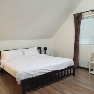 Katil atau katil-katil dalam bilik di Pattaya 6 bedroom pool villa