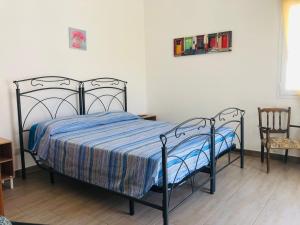 Postel nebo postele na pokoji v ubytování Casa nel Salento da Nico