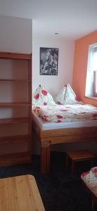 Postel nebo postele na pokoji v ubytování Penzion Iva + 16 fotografií