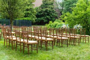 a row of chairs sitting in the grass at Hilton Alexandria Mark Center in Alexandria