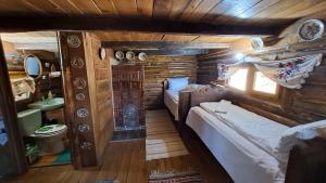 Fotografie z fotogalerie ubytování Pensiunea Marissandra v destinaci Răzoare