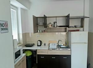 Kuchyň nebo kuchyňský kout v ubytování Railway Hostel