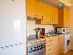 Kuchyňa alebo kuchynka v ubytovaní Apartamento azulera