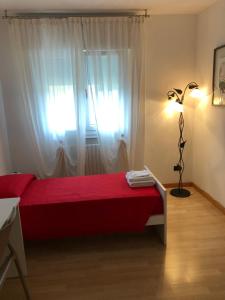 A bed or beds in a room at Bed and Breakfast La Sosta