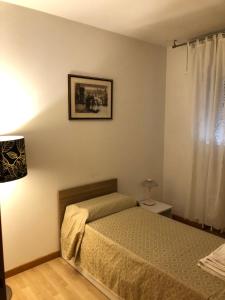 A bed or beds in a room at Bed and Breakfast La Sosta