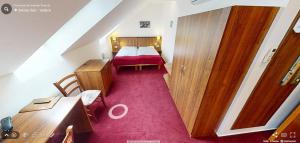 Postel nebo postele na pokoji v ubytování Hotel Selsky Dvur