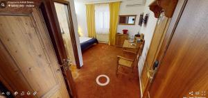 Postel nebo postele na pokoji v ubytování Hotel Selsky Dvur