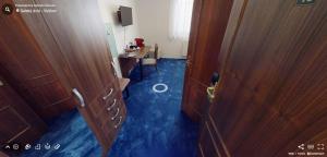 TV a/nebo společenská místnost v ubytování Hotel Selsky Dvur