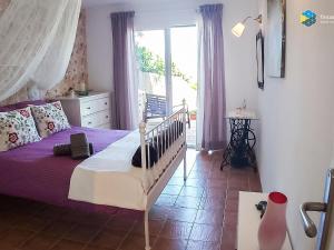 Postel nebo postele na pokoji v ubytování Casa Minina