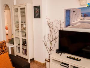 TV a/nebo společenská místnost v ubytování Casa Minina