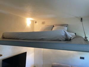 Postel nebo postele na pokoji v ubytování Charming Castagnola