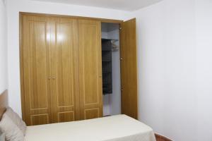 Postel nebo postele na pokoji v ubytování Apartment Gandia Playa Venecia