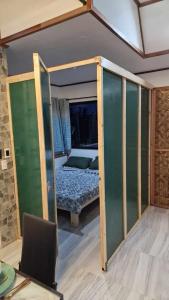 Postel nebo postele na pokoji v ubytování MAYOME TOURIST INN - Moalboal