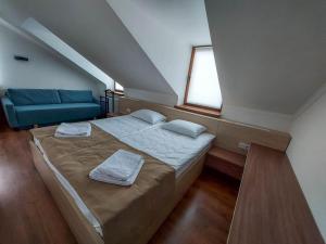 Postel nebo postele na pokoji v ubytování Graff Hotel