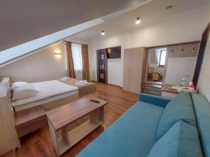 Postel nebo postele na pokoji v ubytování Graff Hotel