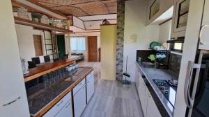 Kuchyň nebo kuchyňský kout v ubytování MAYOME TOURIST INN - Moalboal