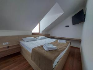 Postel nebo postele na pokoji v ubytování Graff Hotel