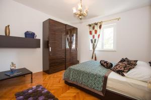 Vuode tai vuoteita majoituspaikassa Aida Apartments and Rooms for couples and families FREE PARKING