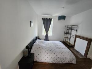 Postel nebo postele na pokoji v ubytování Magnifique T3 Guéret