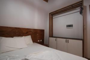 Postel nebo postele na pokoji v ubytování Vila Mateus
