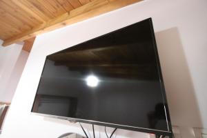 En tv och/eller ett underhållningssystem på Vila Mateus