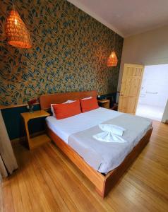 Ένα ή περισσότερα κρεβάτια σε δωμάτιο στο Hotel Aranjuez